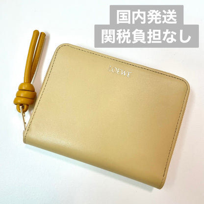 LOEWE ロエベ 財布 ウォレット ノット コンパクト ジップアラウンドレディース シャイニーナパカーフ 黄 イエロー ミニ財布